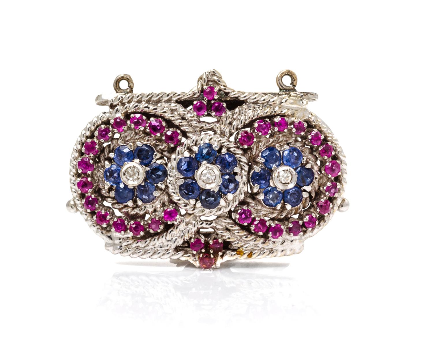 An 18 Karat White Gold, Sapphire, Ruby and Diamond Multi Strand Clasp, 8.00 dwts.