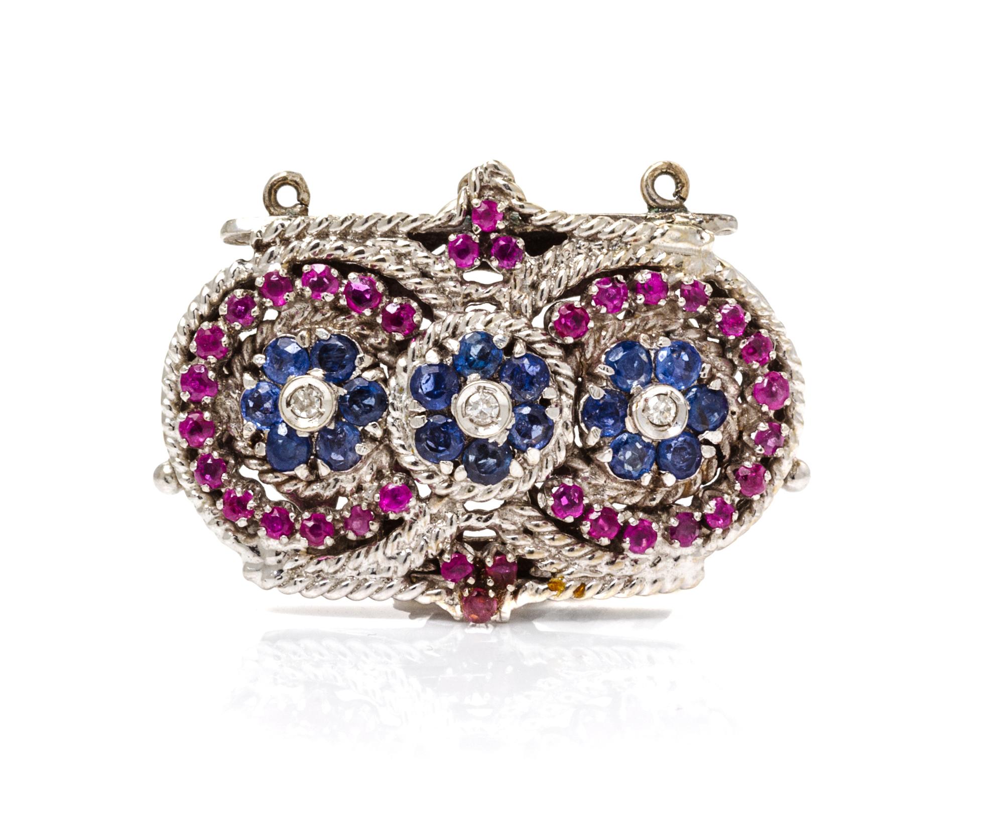 An 18 Karat White Gold, Sapphire, Ruby and Diamond Multi Strand Clasp, 8.00 dwts.