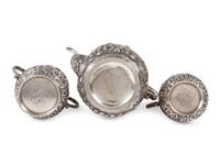 A Repousse Silver Three-Piece Tea Service