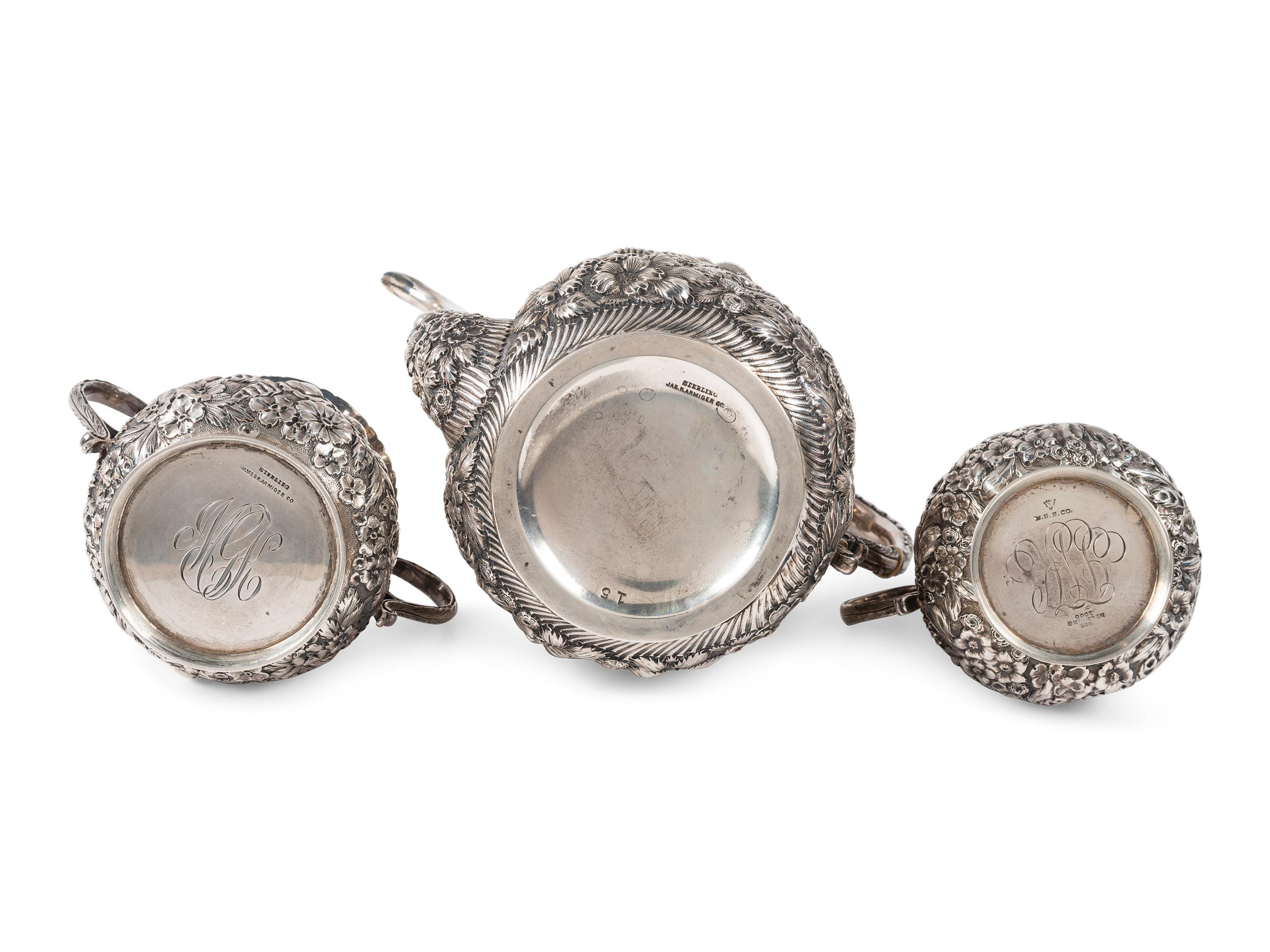 A Repousse Silver Three-Piece Tea Service