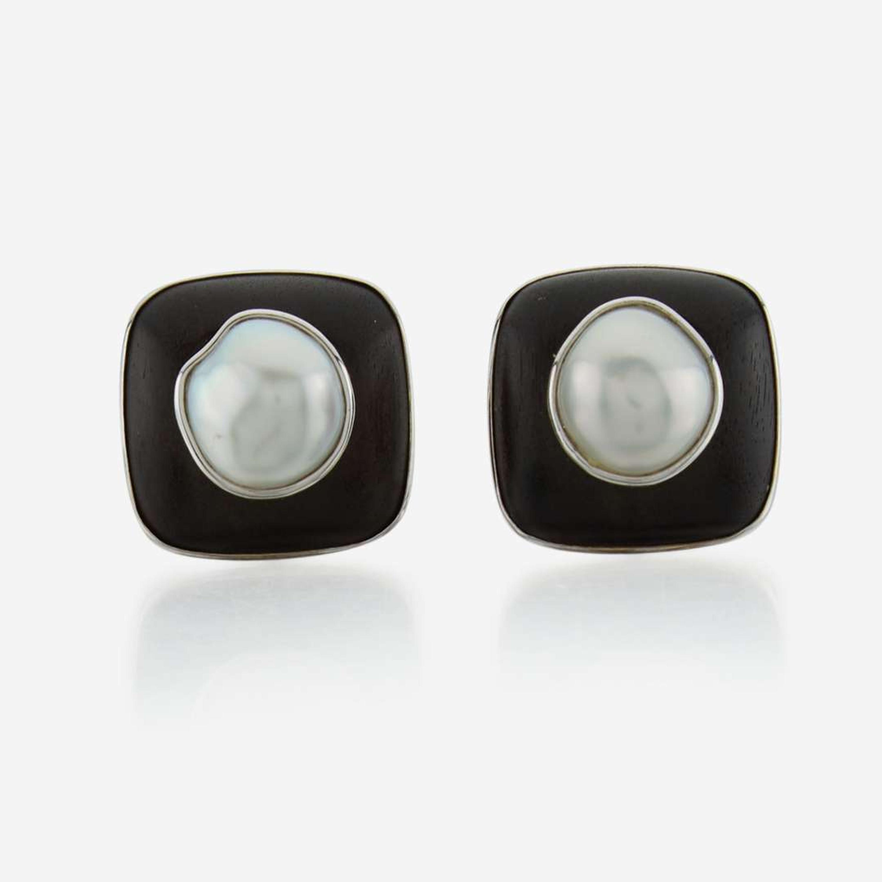A white gold, ebony, diamond, and pearl necklace with matching earrings Trianon by Seaman Schepps