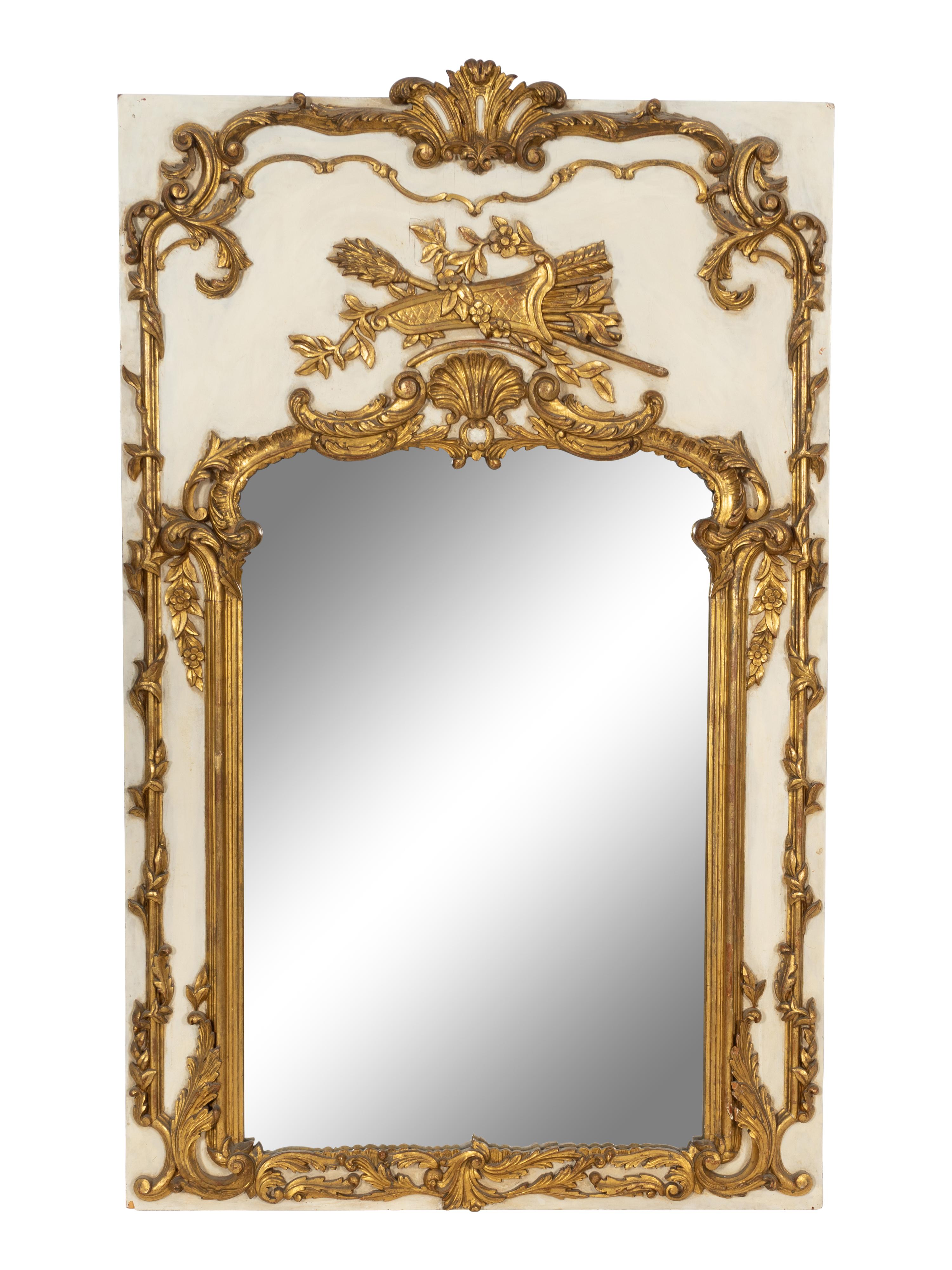 A Louis XVI Style Cream-Painted and Parcel Gilt Pier Mirror