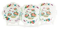 Ten Pieces of English Polychrome Decorated Molded Porcelain Plates Length of largest 9 1/4 inches. — 19TH CENTURY