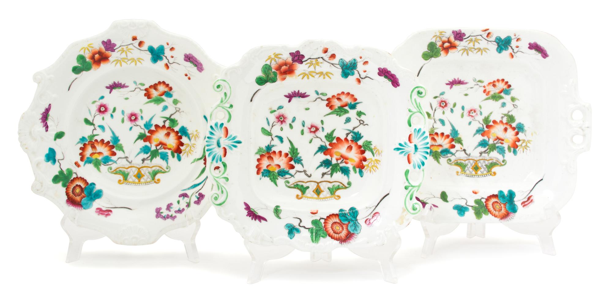 Ten Pieces of English Polychrome Decorated Molded Porcelain Plates Length of largest 9 1/4 inches. — 19TH CENTURY