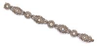 A Yellow Gold, Silver and Diamond Bracelet, 16.00 dwts.
