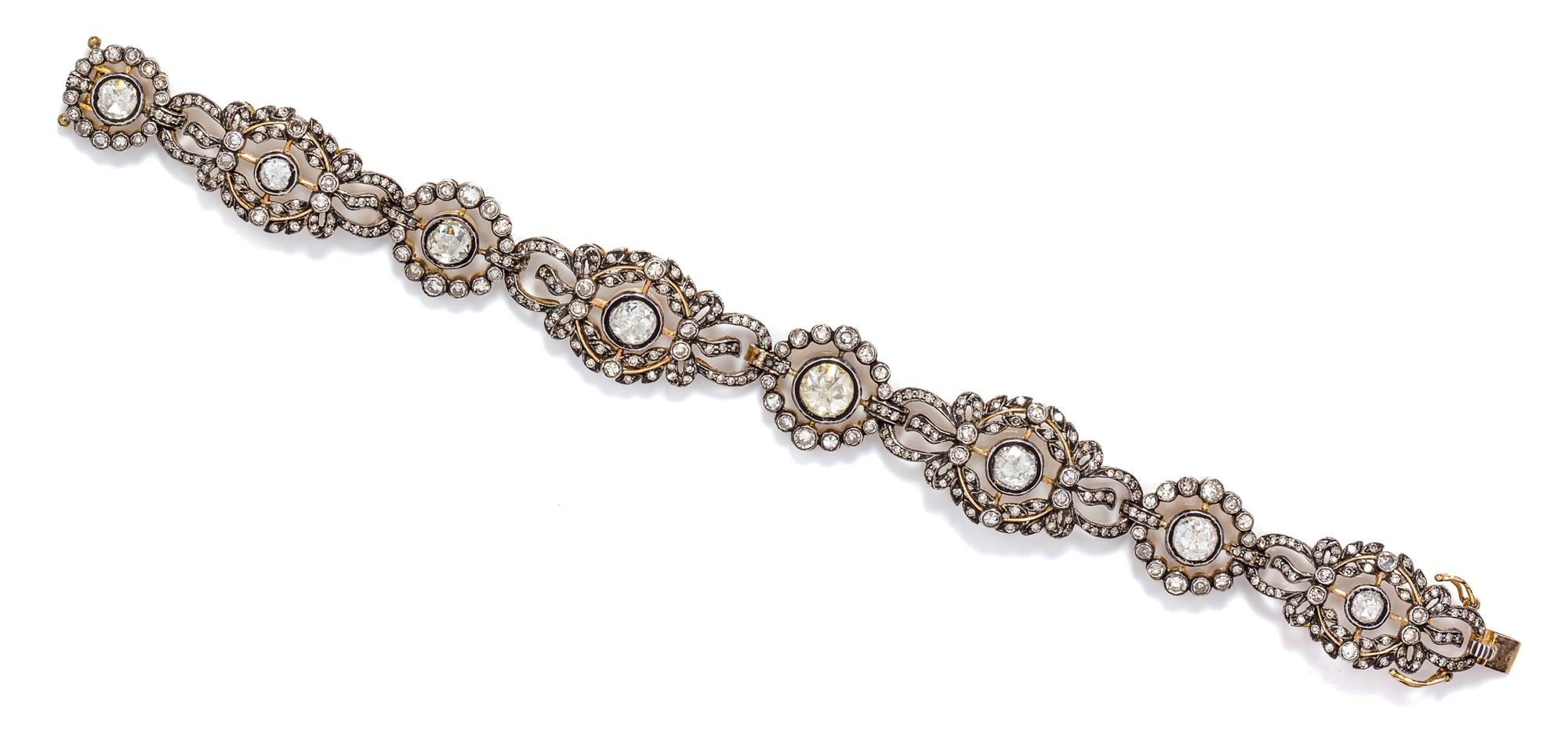 A Yellow Gold, Silver and Diamond Bracelet, 16.00 dwts.