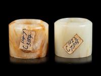 Two Russet and White Jade Archer's Rings