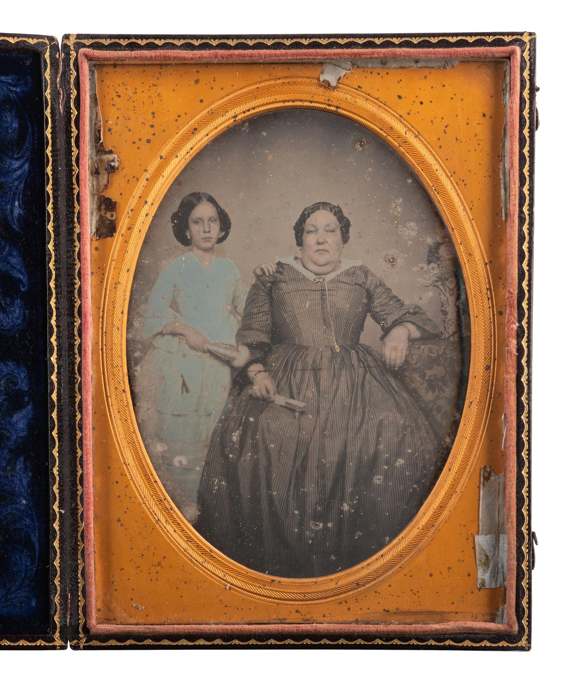 [EARLY PHOTOGRAPHY]. A pair of half plate daguerreotype portraits featuring a full-figured woman with a young girl comprising: