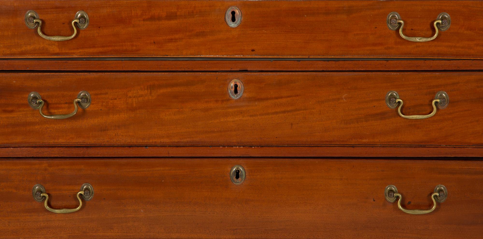 A George III Style Mahogany Bachelor's Chest with Pull-out Slide