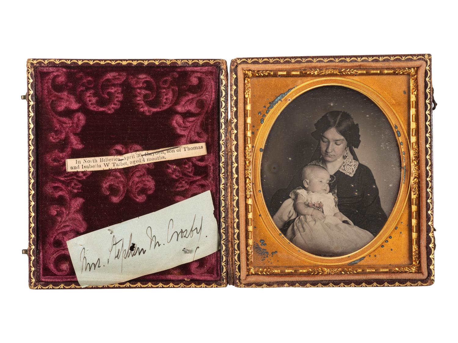 [EARLY PHOTOGRAPHY]. Sixth plate postmortem daguerreotype of a baby identified as the son of Massachusetts Governor Thomas Talbot. Ca 1857.