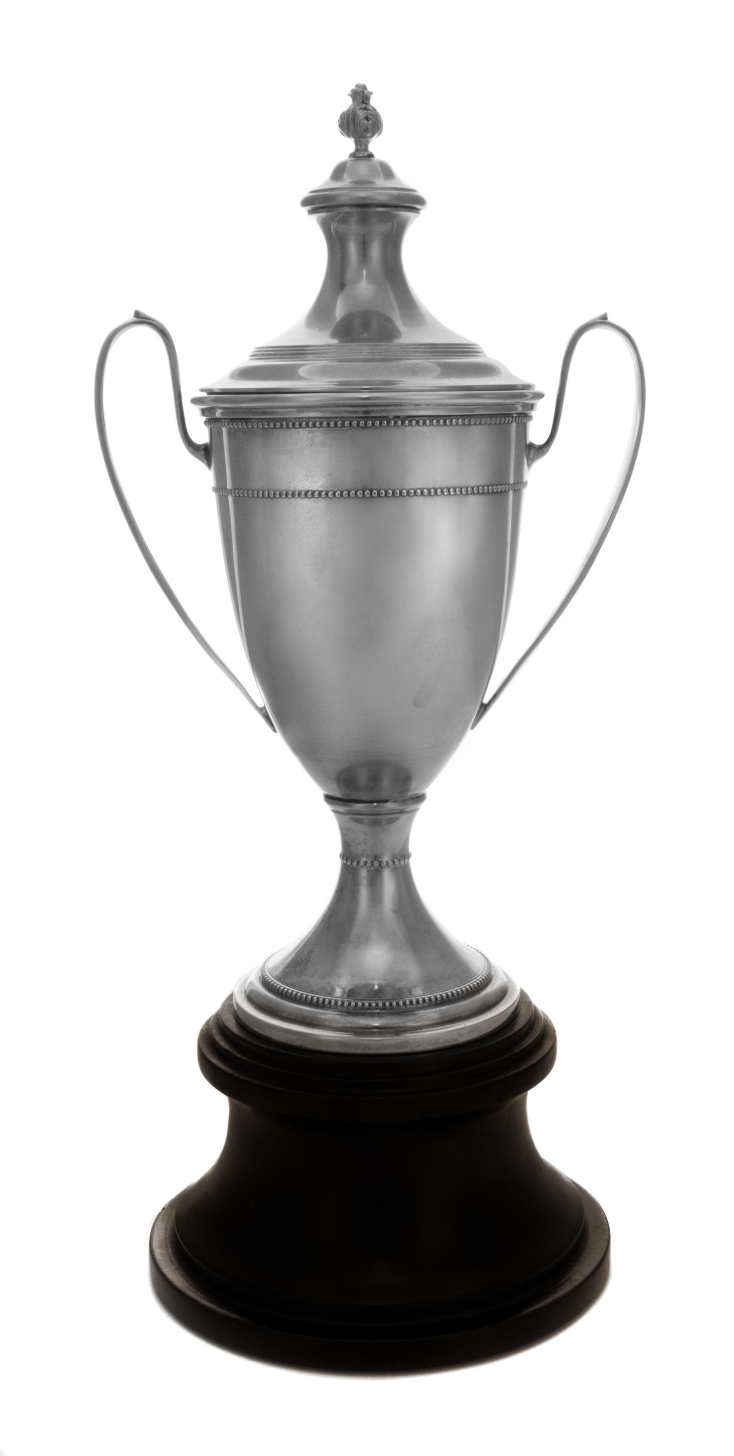 An American Silver Trophy, M. Fred Hirsch Co., Jersey City, NJ, of two handled baluster form surmounted by a foliate finial and raised