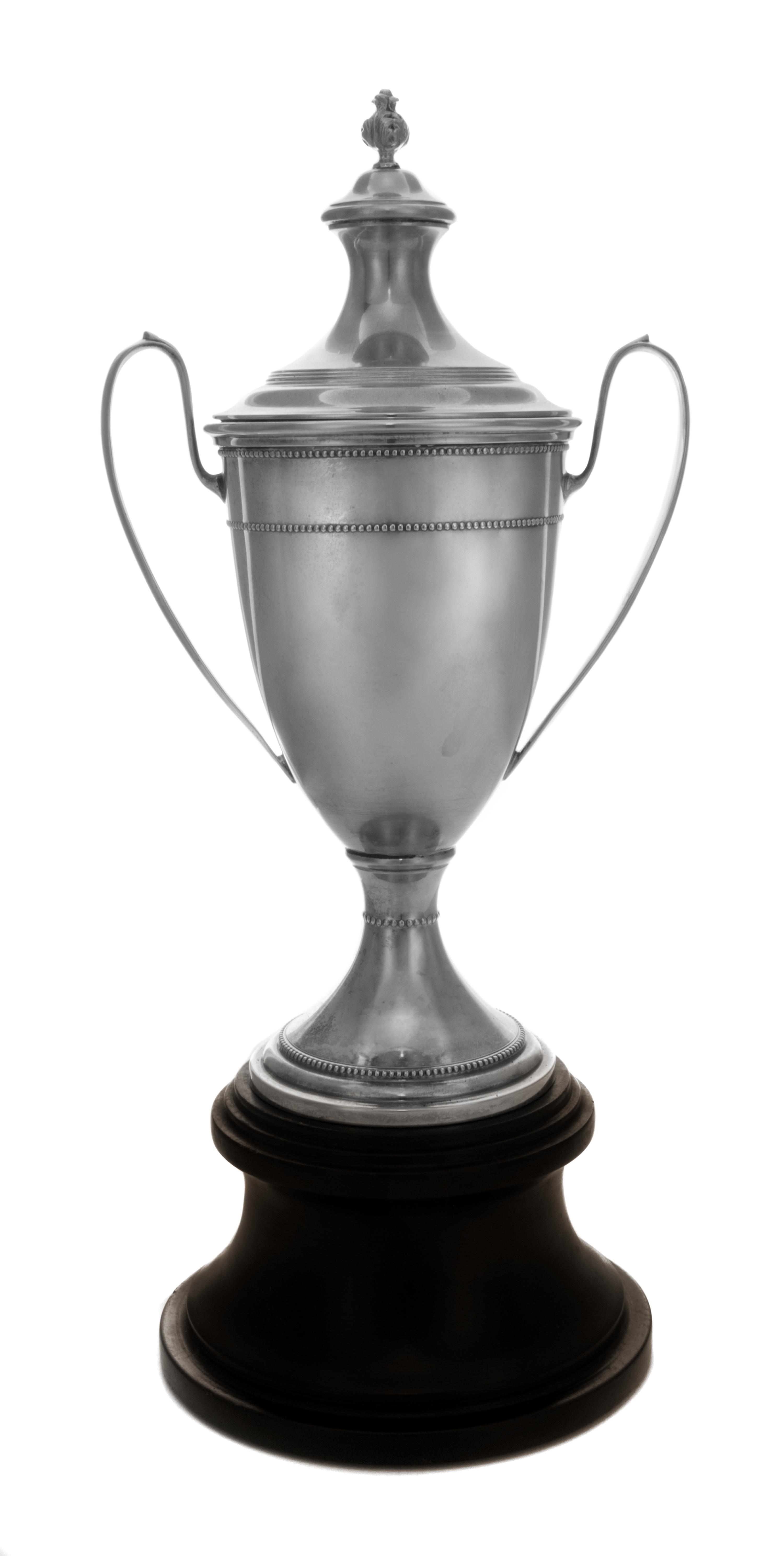 An American Silver Trophy, M. Fred Hirsch Co., Jersey City, NJ, of two handled baluster form surmounted by a foliate finial and raised