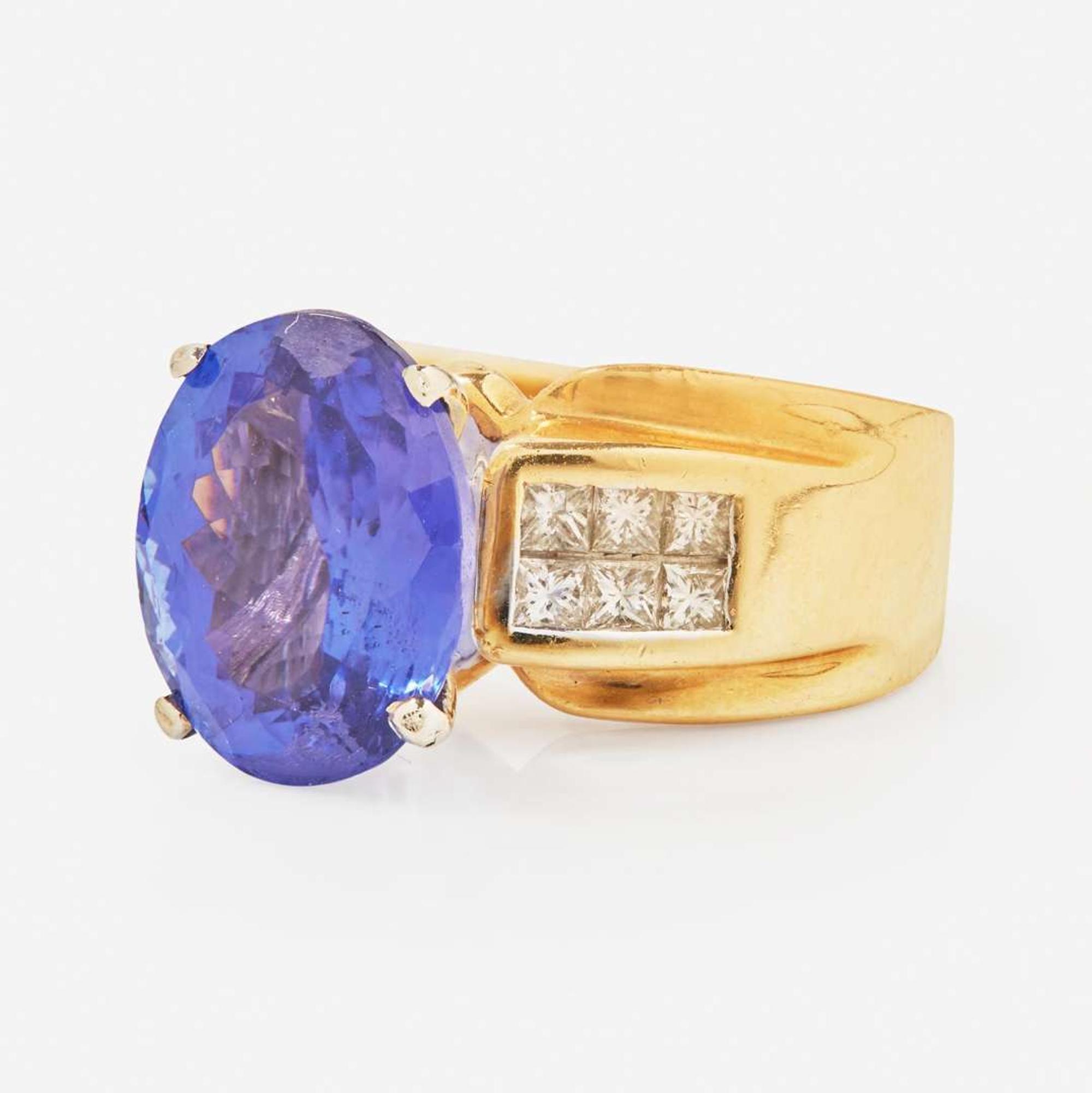 A 14K Yellow Gold, Tanzanite, and Diamond Ring