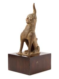 A Chinese Earthenware Figure of an Earth Spirit TANG DYNASTY Height of figure 13 1/2 inches. — TANG DYNASTY