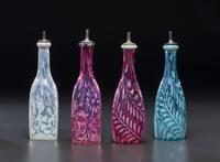 Four Fern Opalescent Glass Barber's Bottles