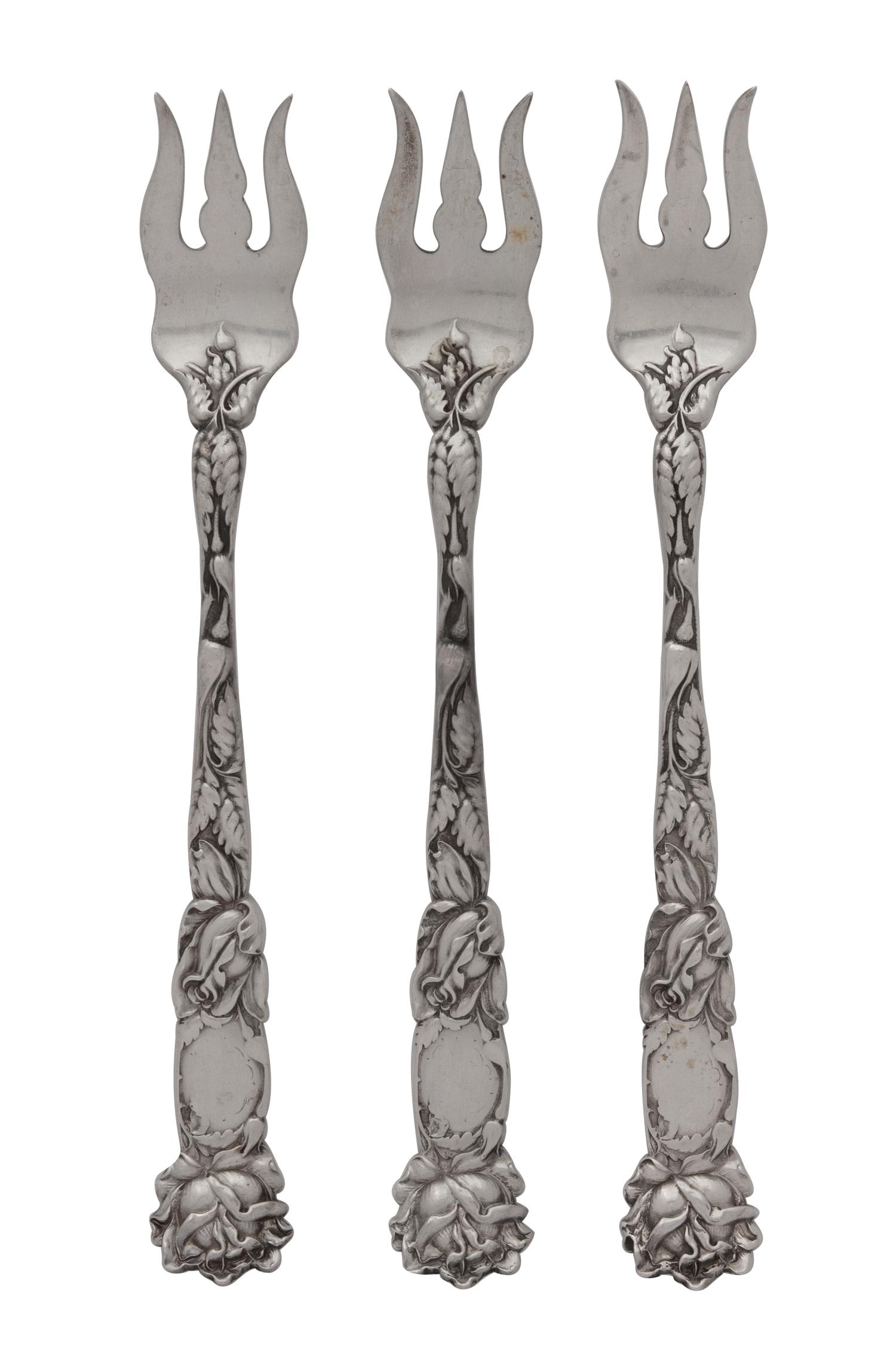A Group of Twelve Silver Seafood Forks