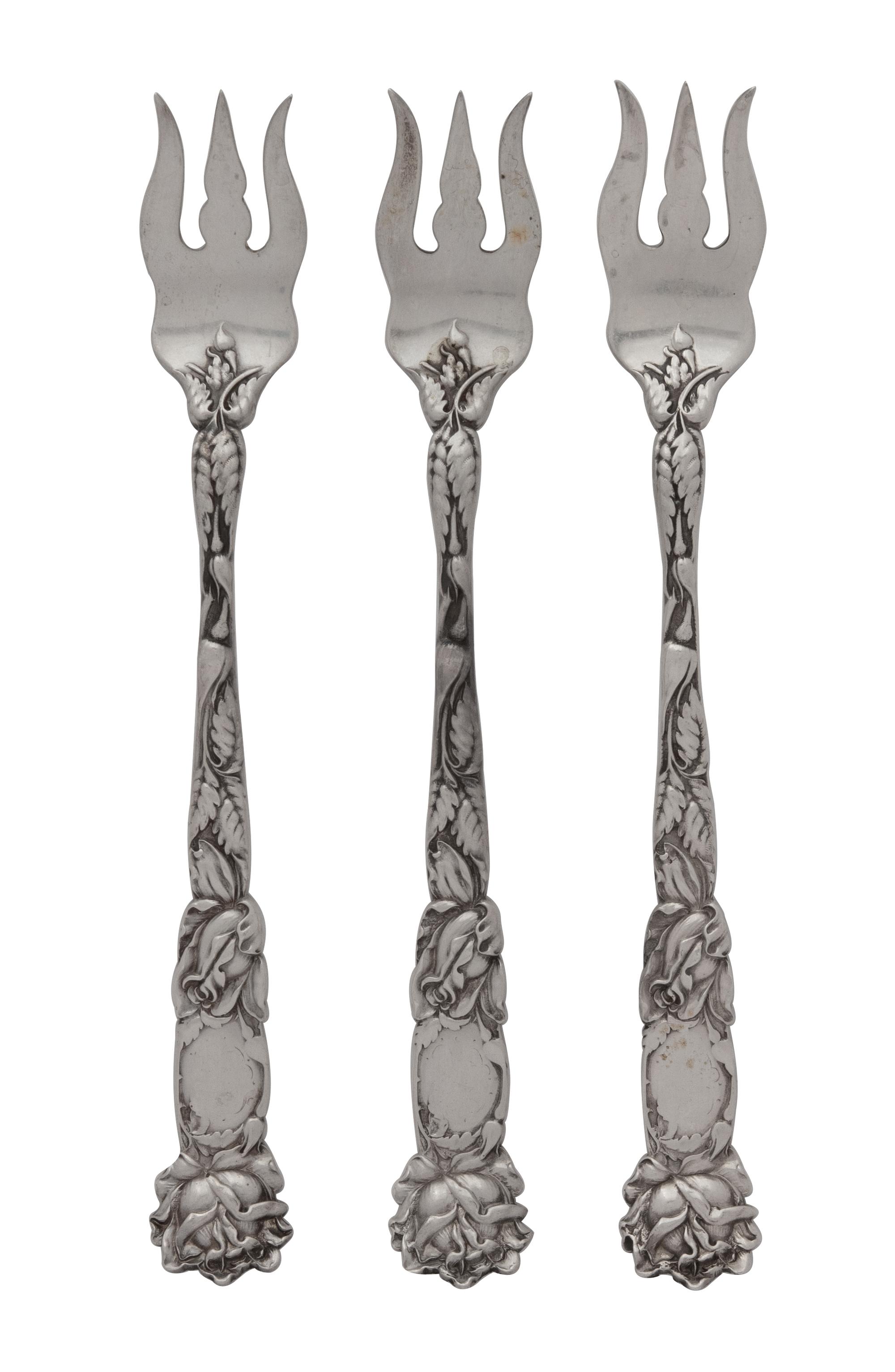 A Group of Twelve Silver Seafood Forks