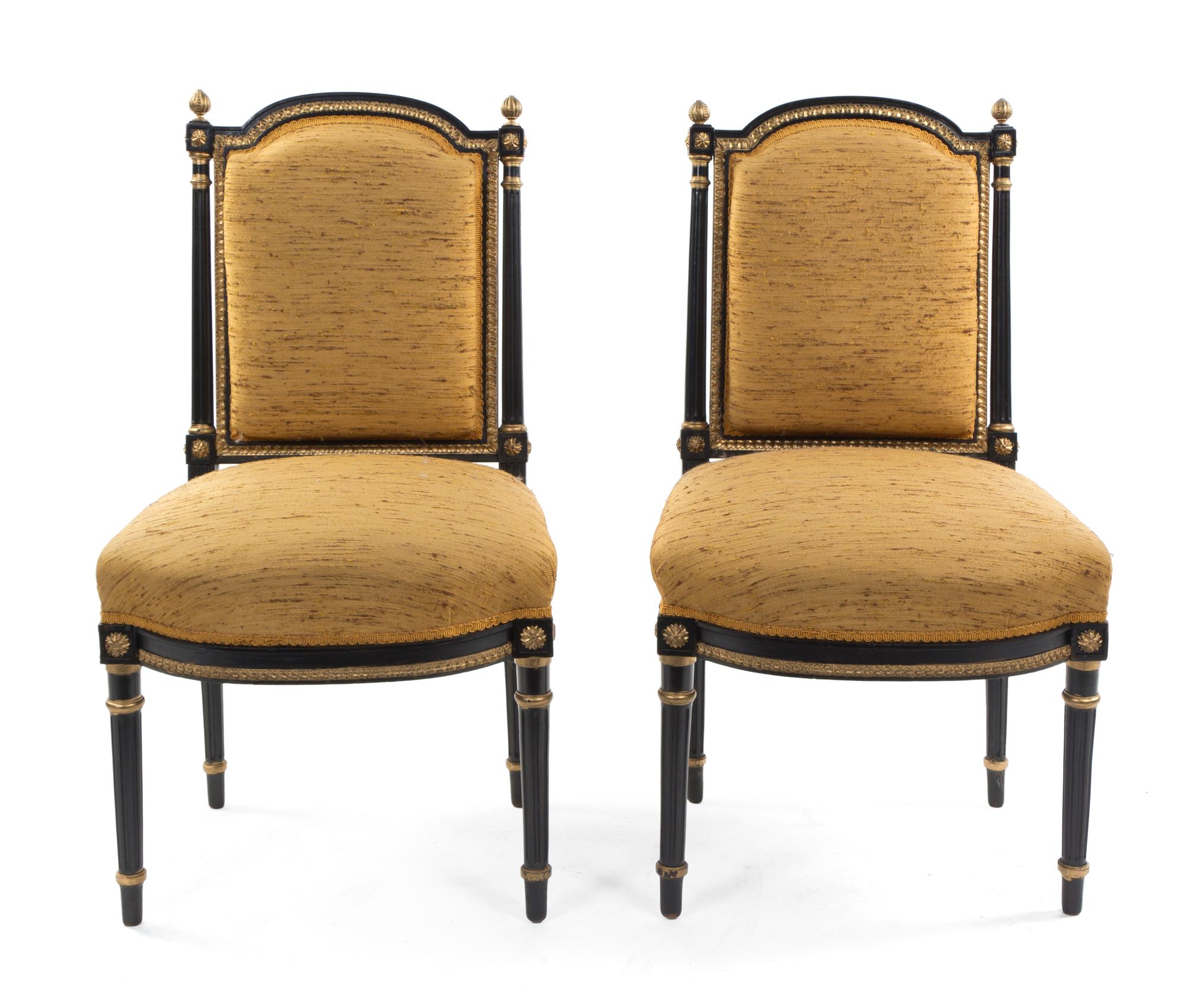 A Pair of Napoleon III Style Ebonized and Parcel Gilt Side Chairs, Height 36 inches.