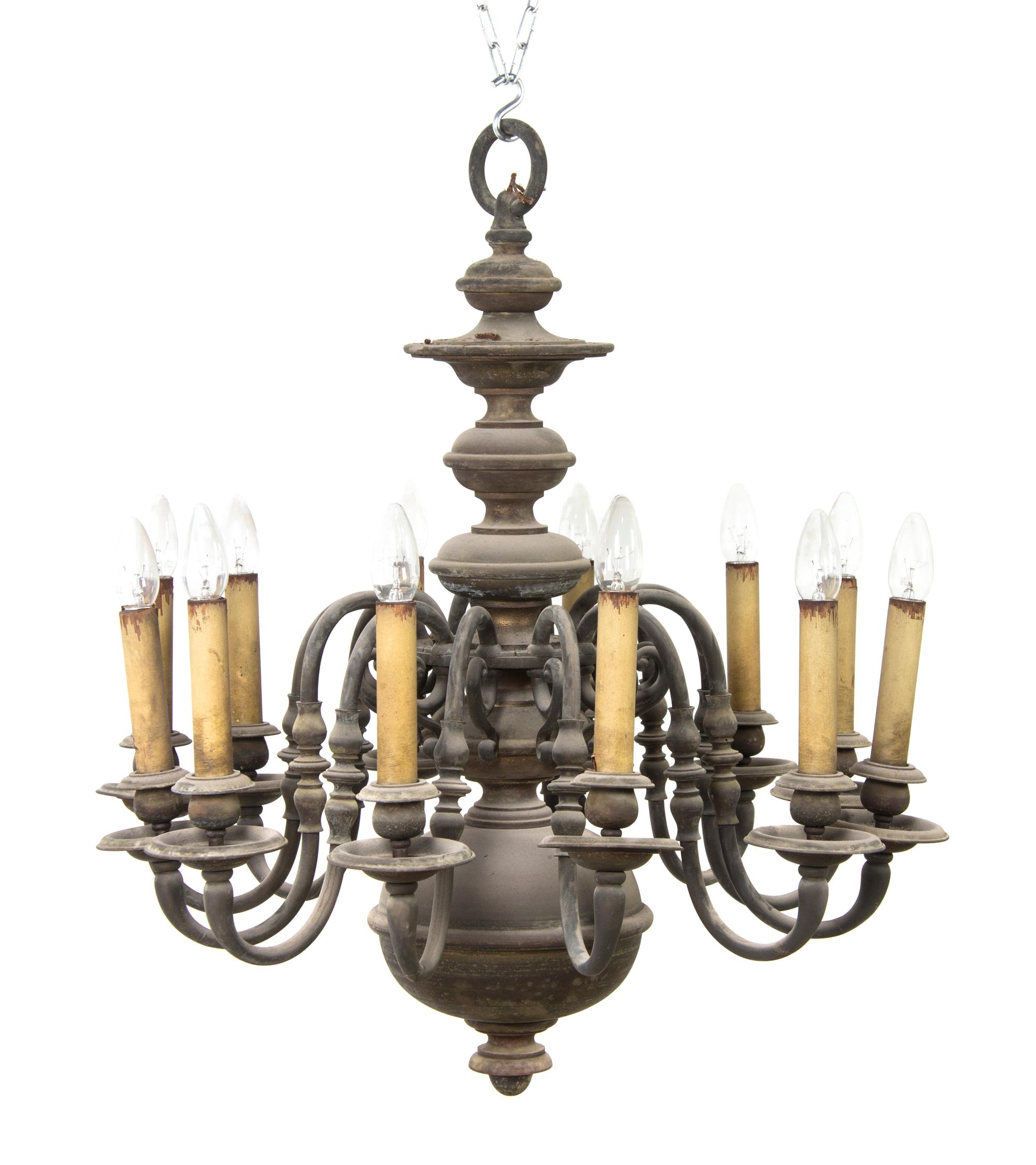 A Dutch Baroque Style Brass Twelve-Light Chandelier, Approximate height 37 x diameter 30 inches.