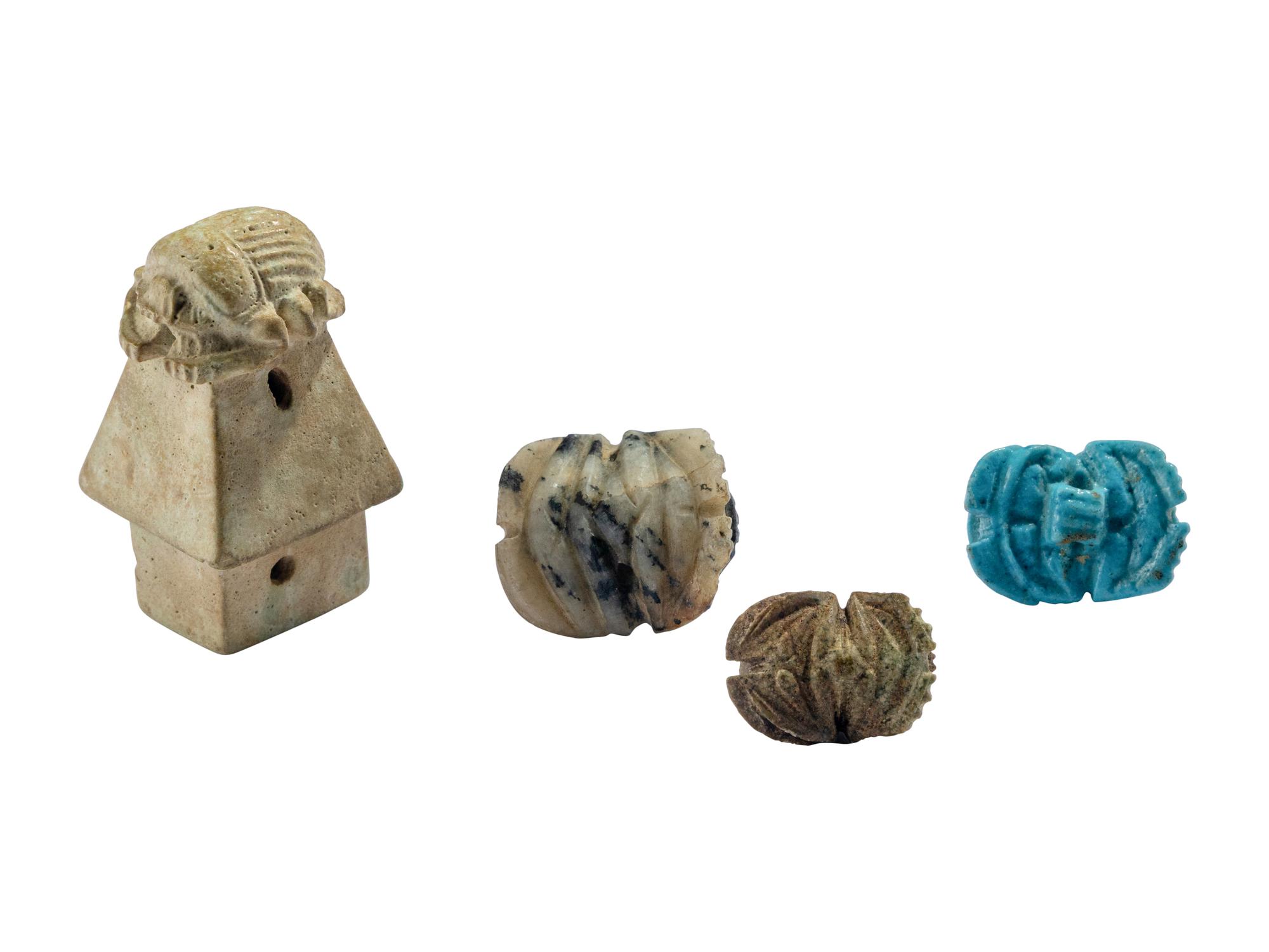 Four Egyptian Faience and Stone Scarabs
