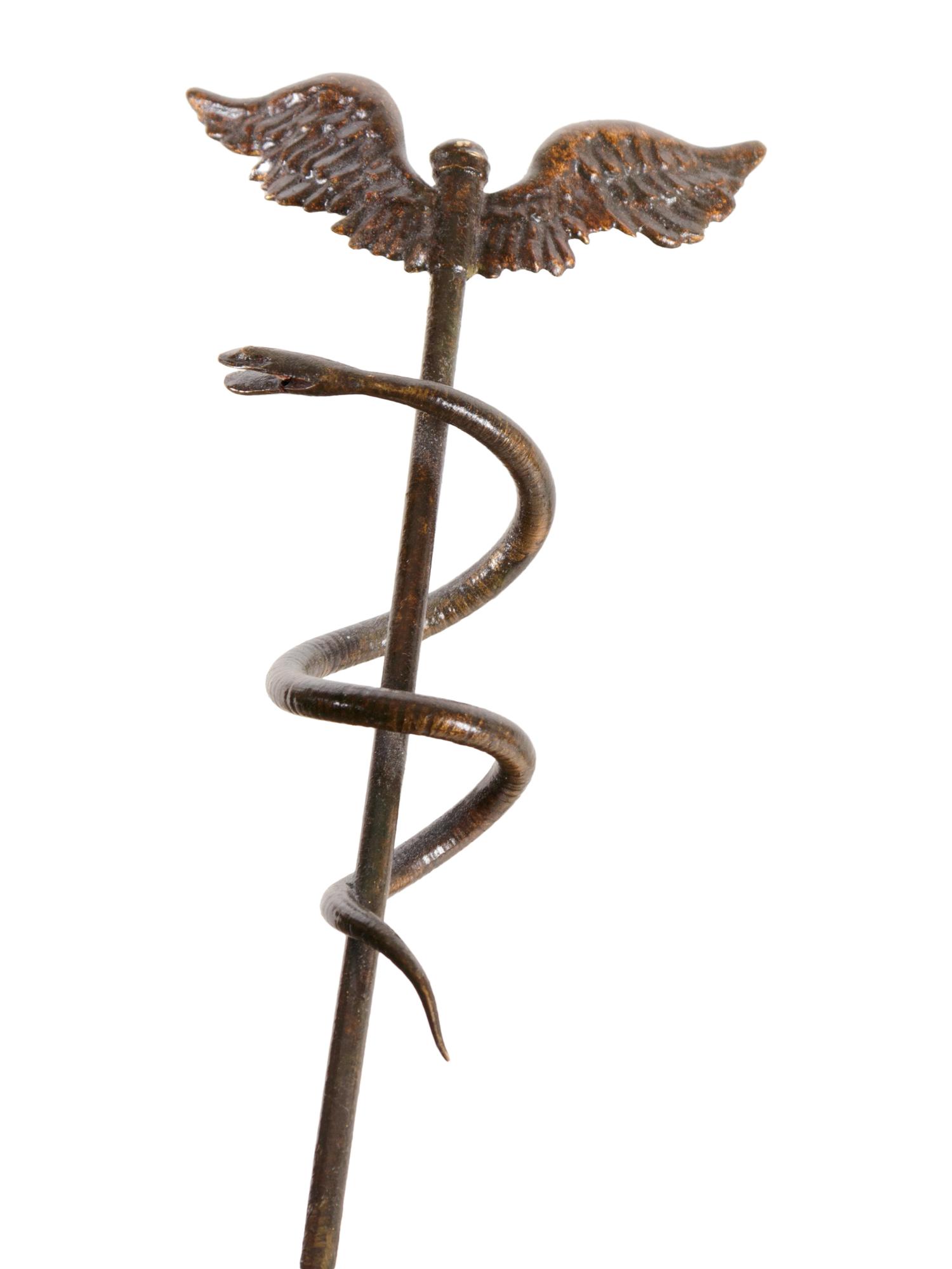 An Empire Style Gilt and Patinated Bronze and Marble Clock Garniture