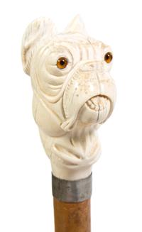 A Continental Carved Ivory and Wood Walking Stick, Height overall 37 x height of handle 3 7/8 inches.