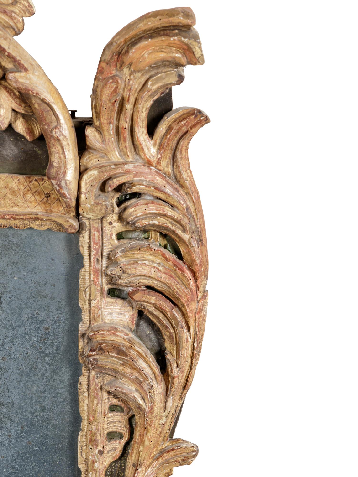 A Régence Carved Giltwood Mirror