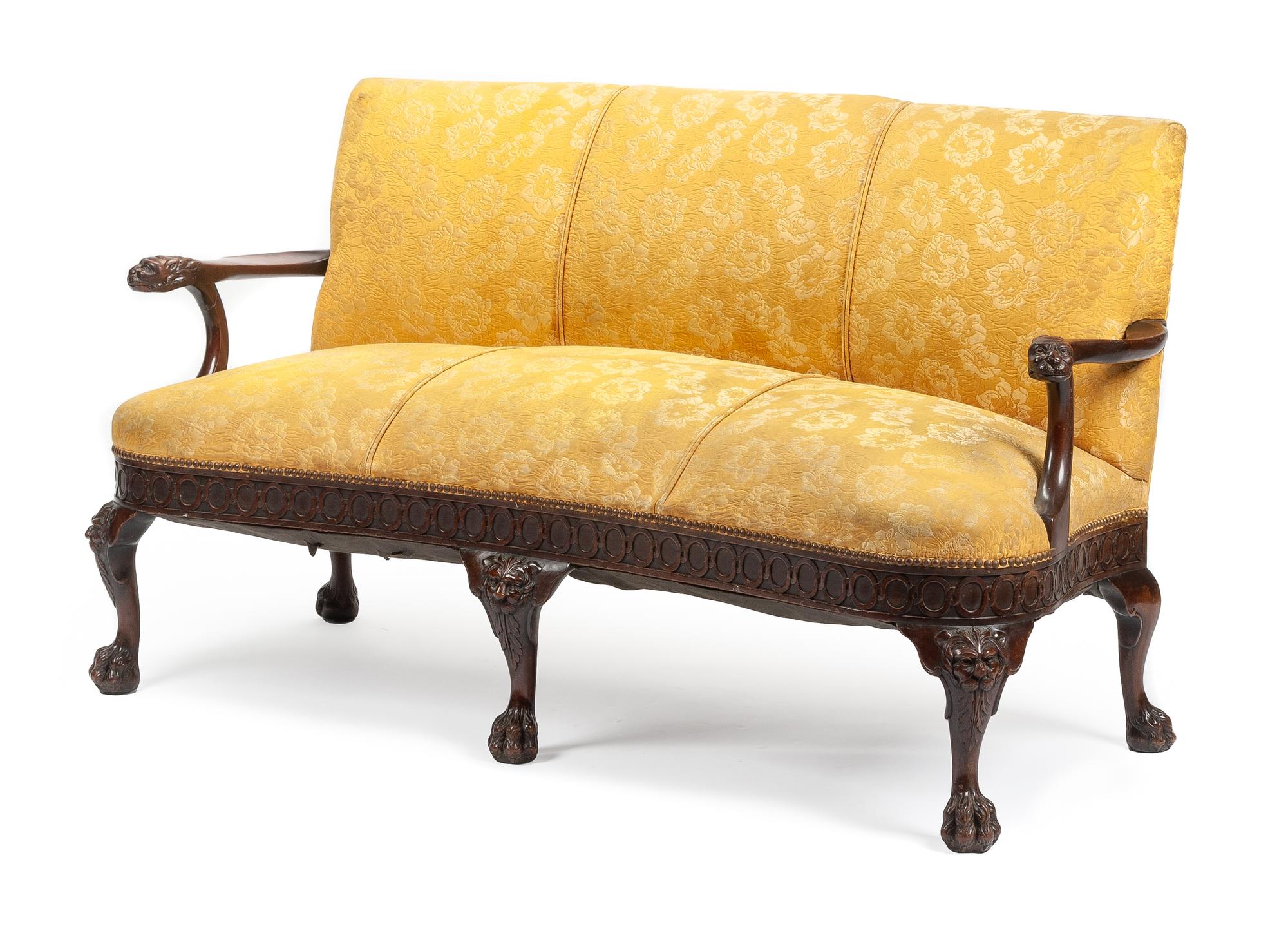 A George II Style Carved Mahogany Sofa Height 35 x width 62 x depth 27 inches. — 19TH CENTURY