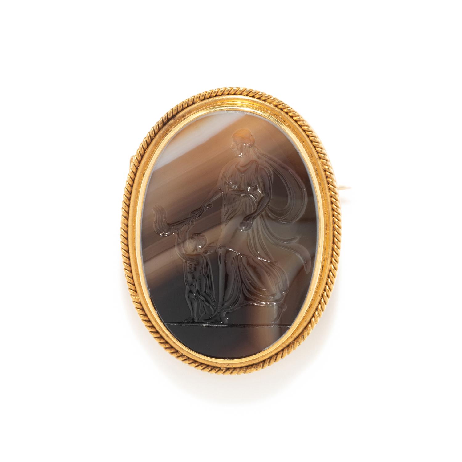 A Gold Brooch with A Banded Agate Engraved Intaglio