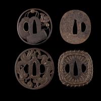 Four Japanese Inlaid Cast Iron Tsuba