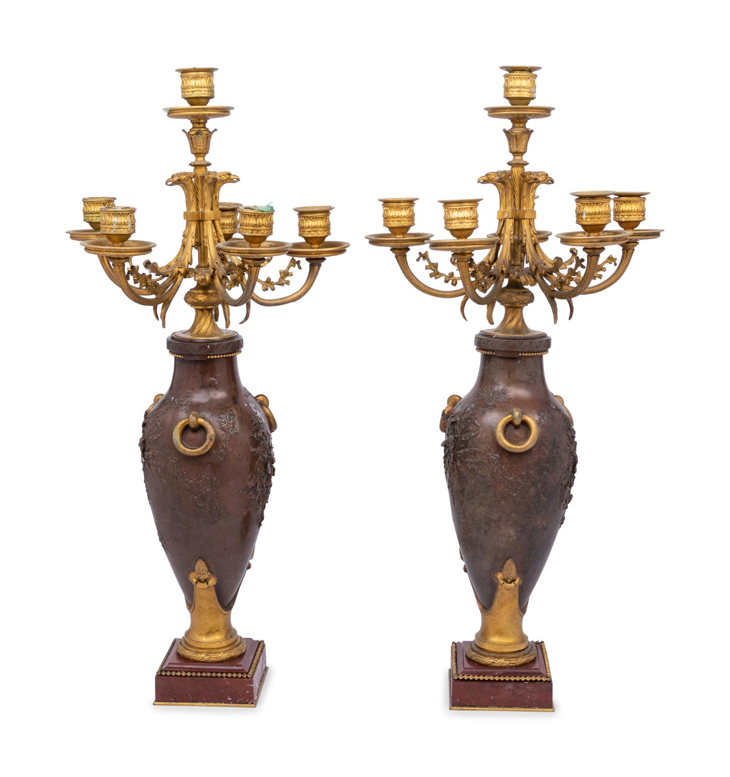 A Pair of Louis XVI Style Gilt and Patinated Bronze Six-Light Candelabra