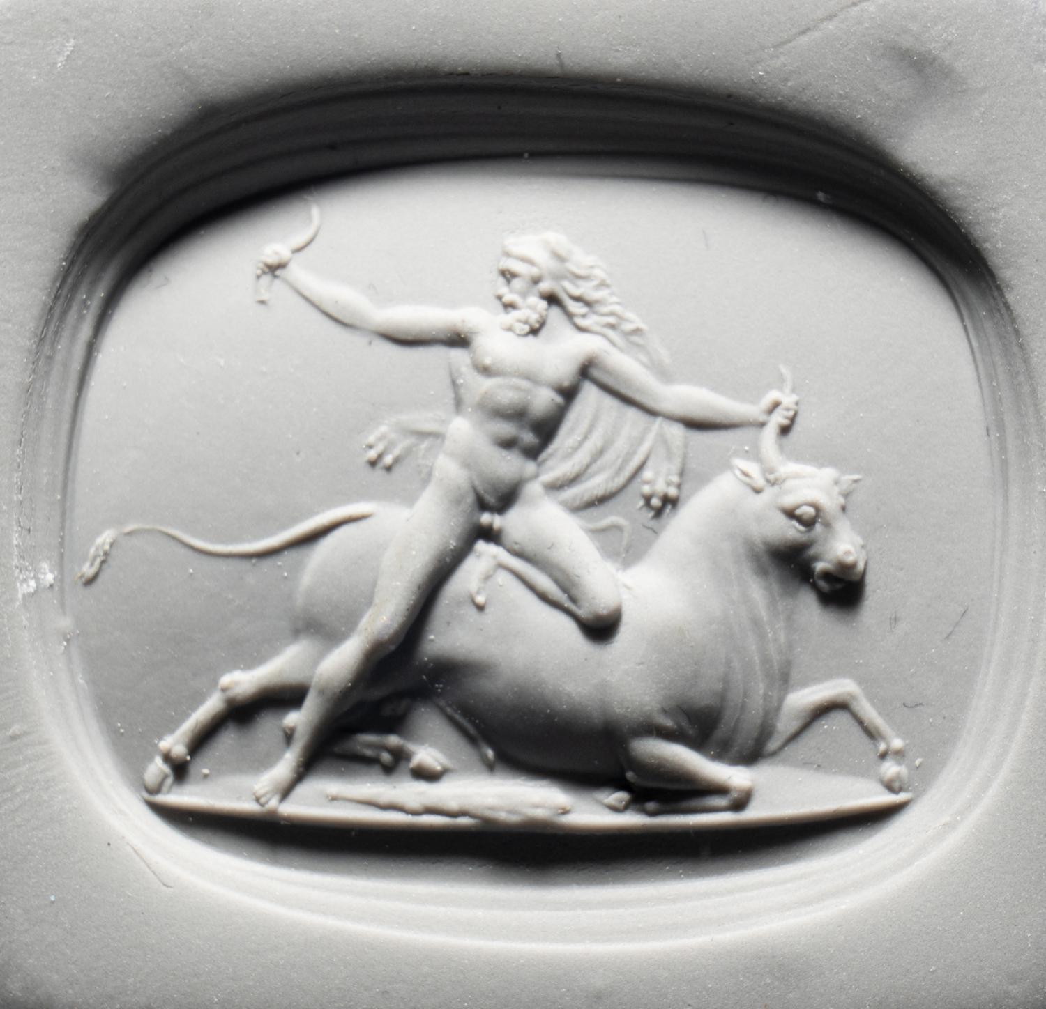 A Neoclassical Carnelian Intaglio with Hercules Battling Achelous