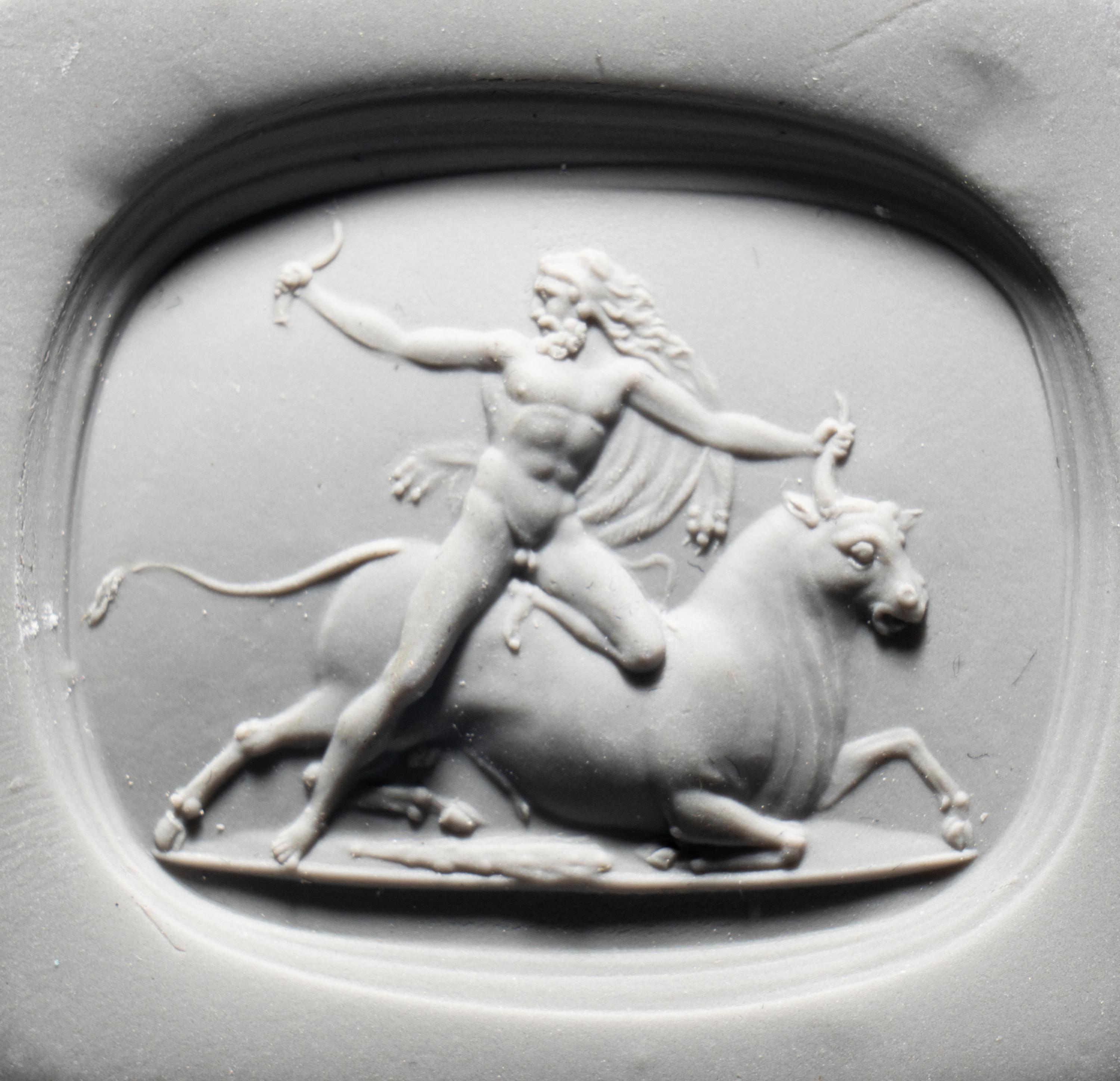 A Neoclassical Carnelian Intaglio with Hercules Battling Achelous