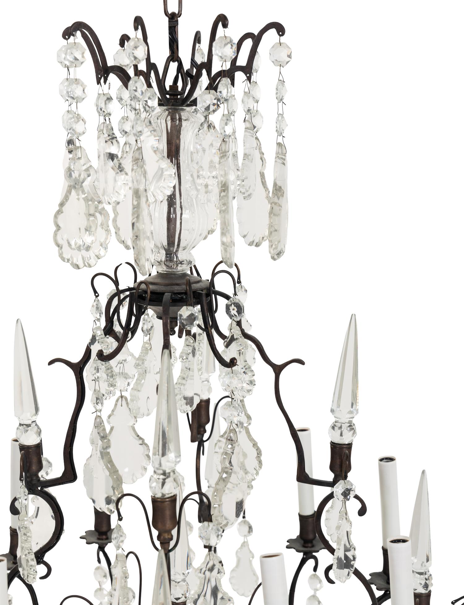 An Iron and Glass Eight-Light Chandelier