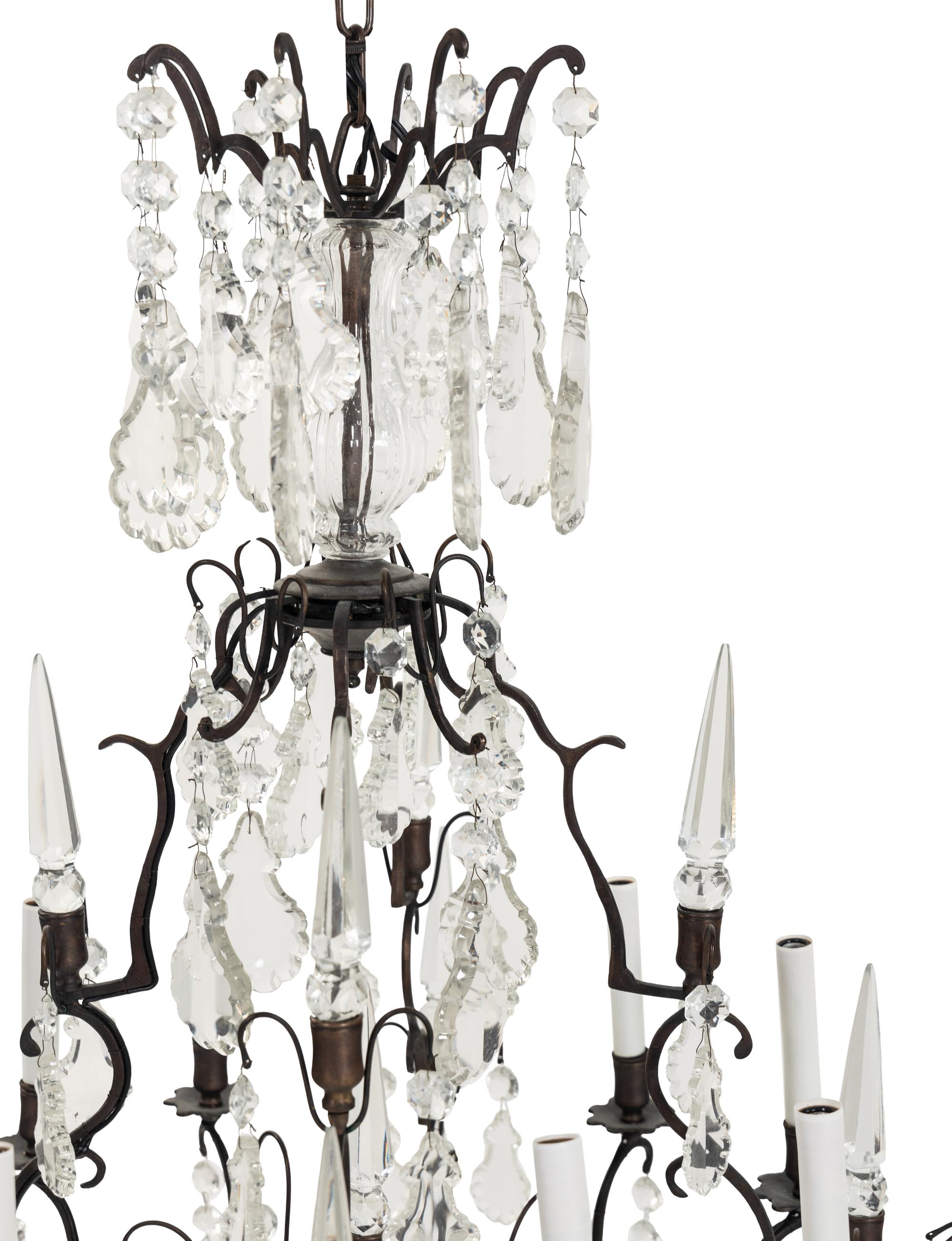 An Iron and Glass Eight-Light Chandelier