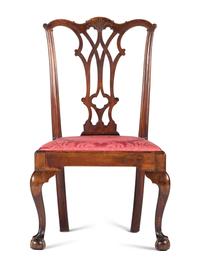 A Chippendale Carved and Figured Mahogany Claw-and-Ball Foot Side Chair