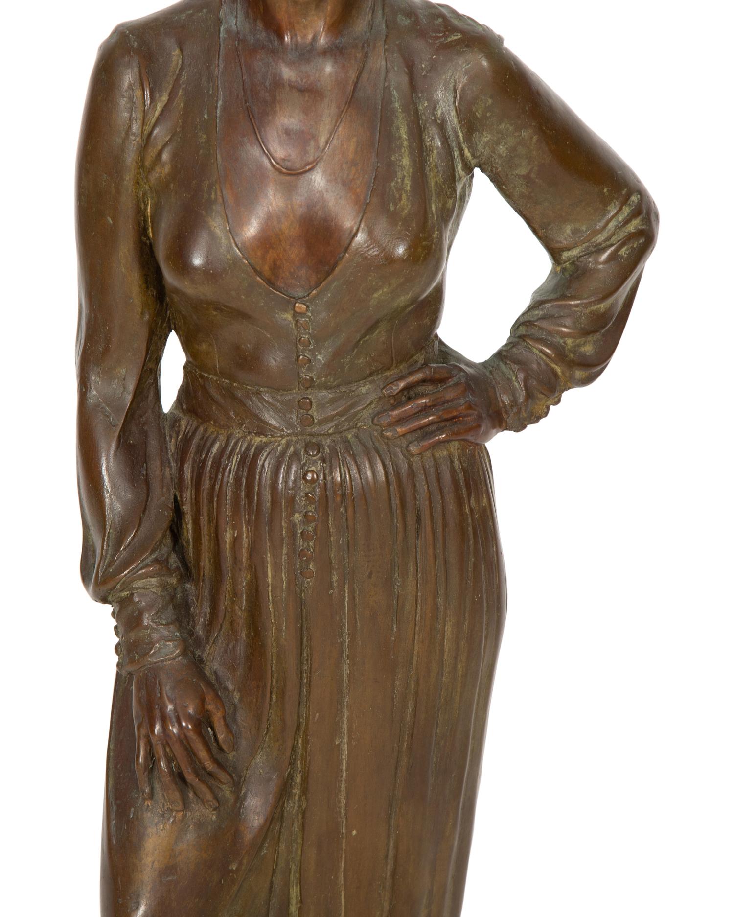 A Bronze Sculpture of a Standing Woman