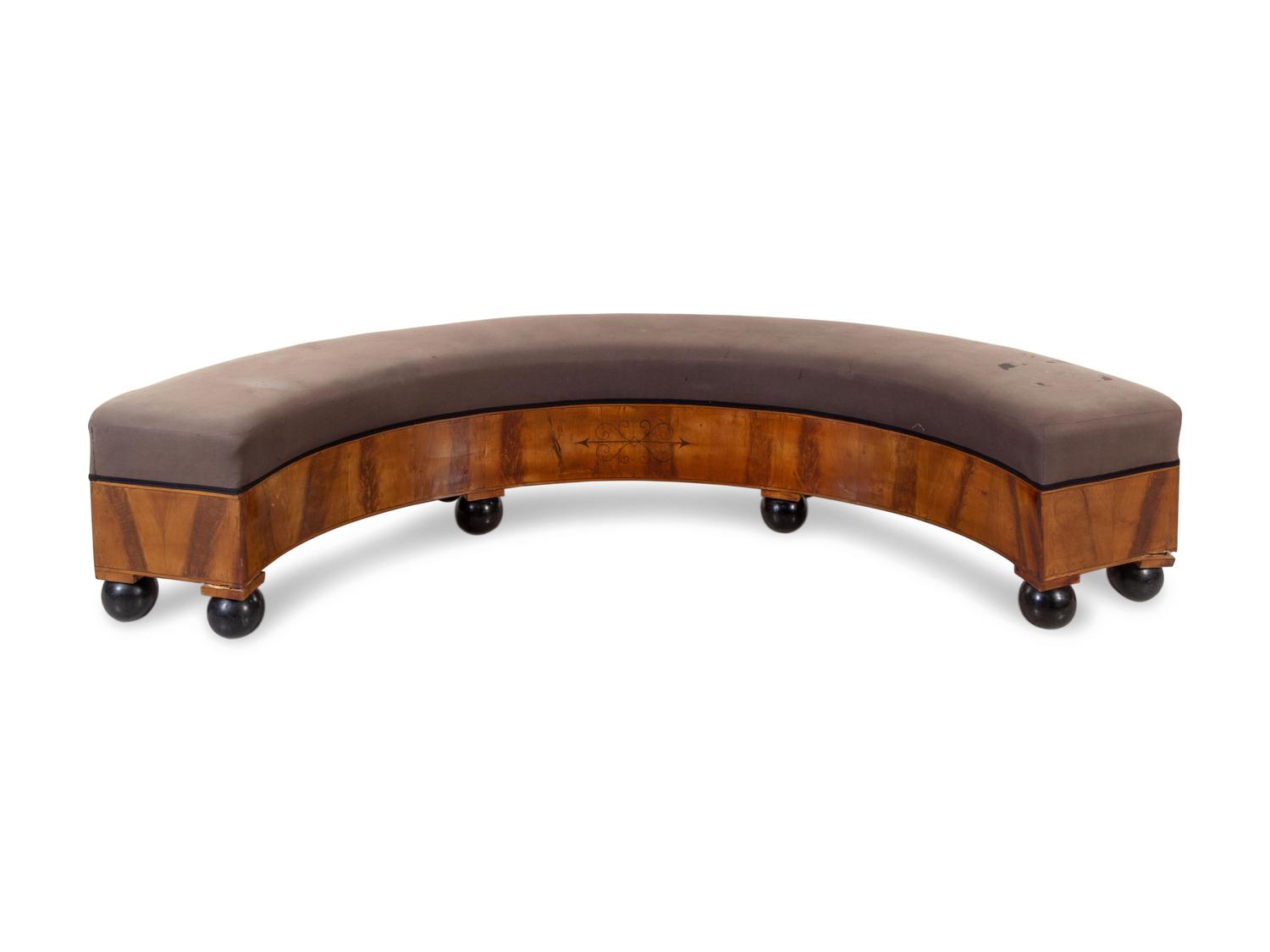 An Austrian Neoclassical Parcel Ebonized Fruitwood Banquette