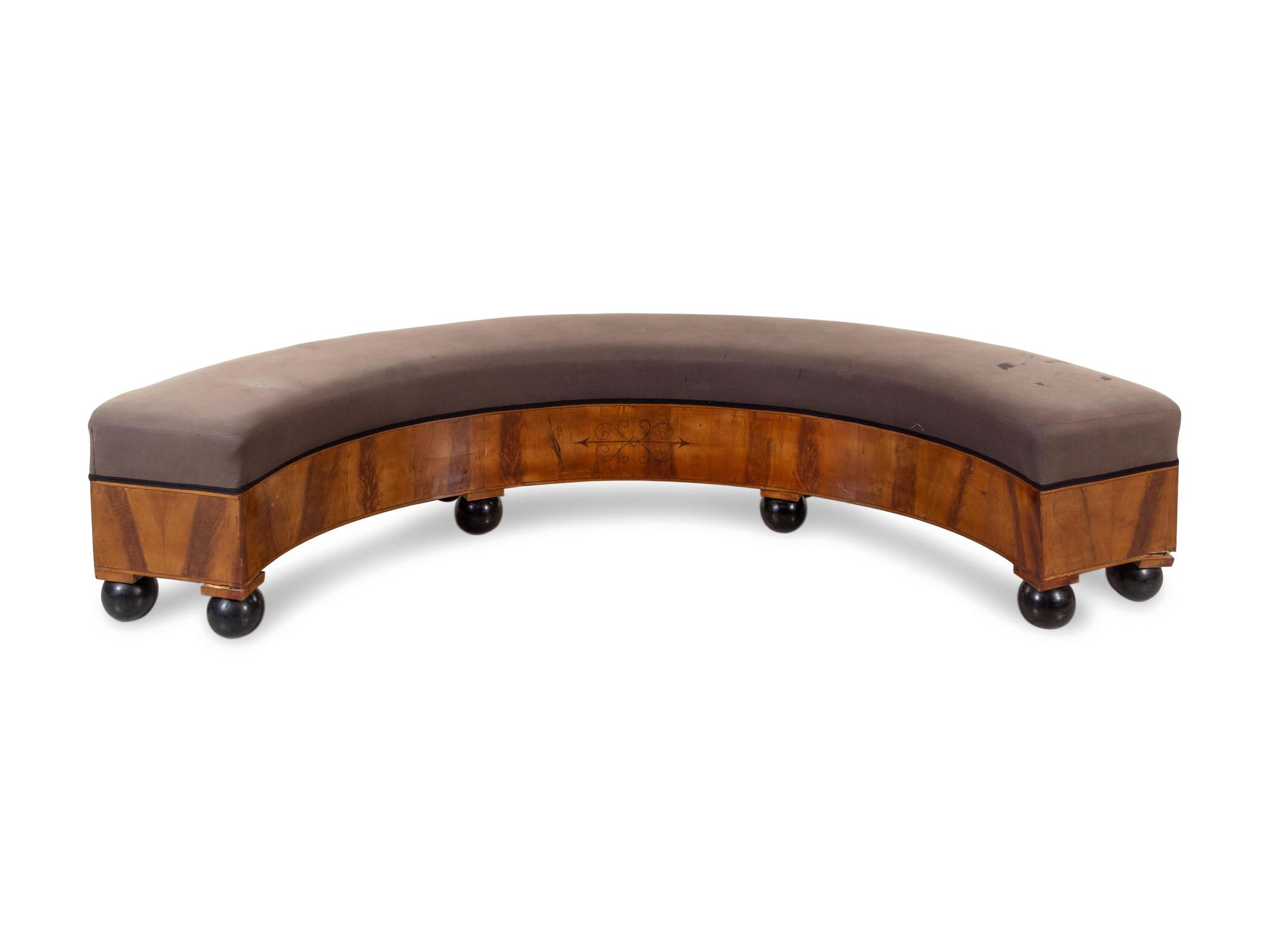 An Austrian Neoclassical Parcel Ebonized Fruitwood Banquette