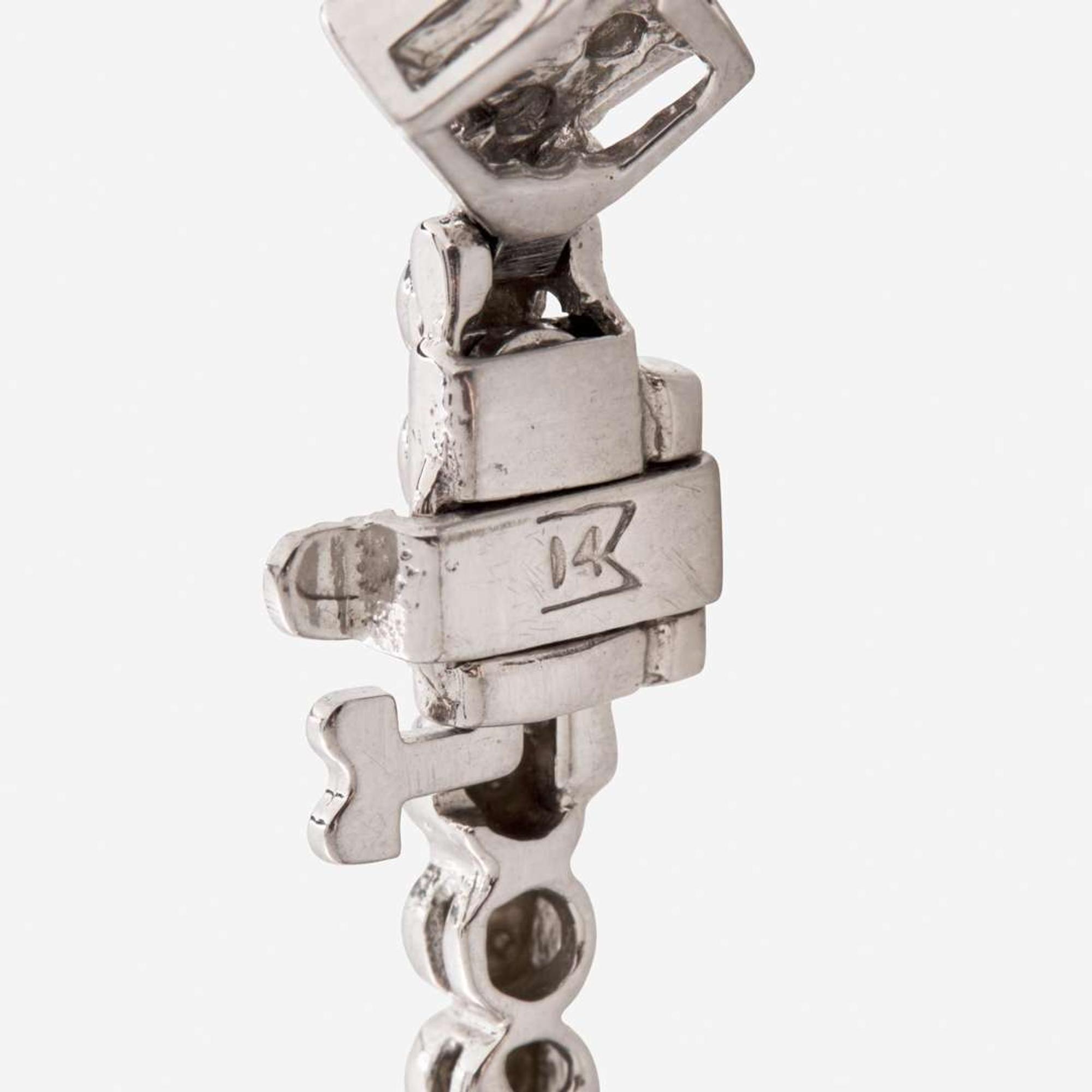 A 14K White Gold and Diamond Bracelet