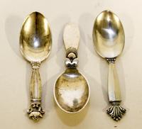 Three Danish Silver Child's Spoons, Georg Jensen Silversmithy, Copenhagen, comprising one example in the Cactus pattern, one example in