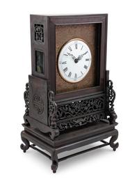 A Hardwood Mantel Clock