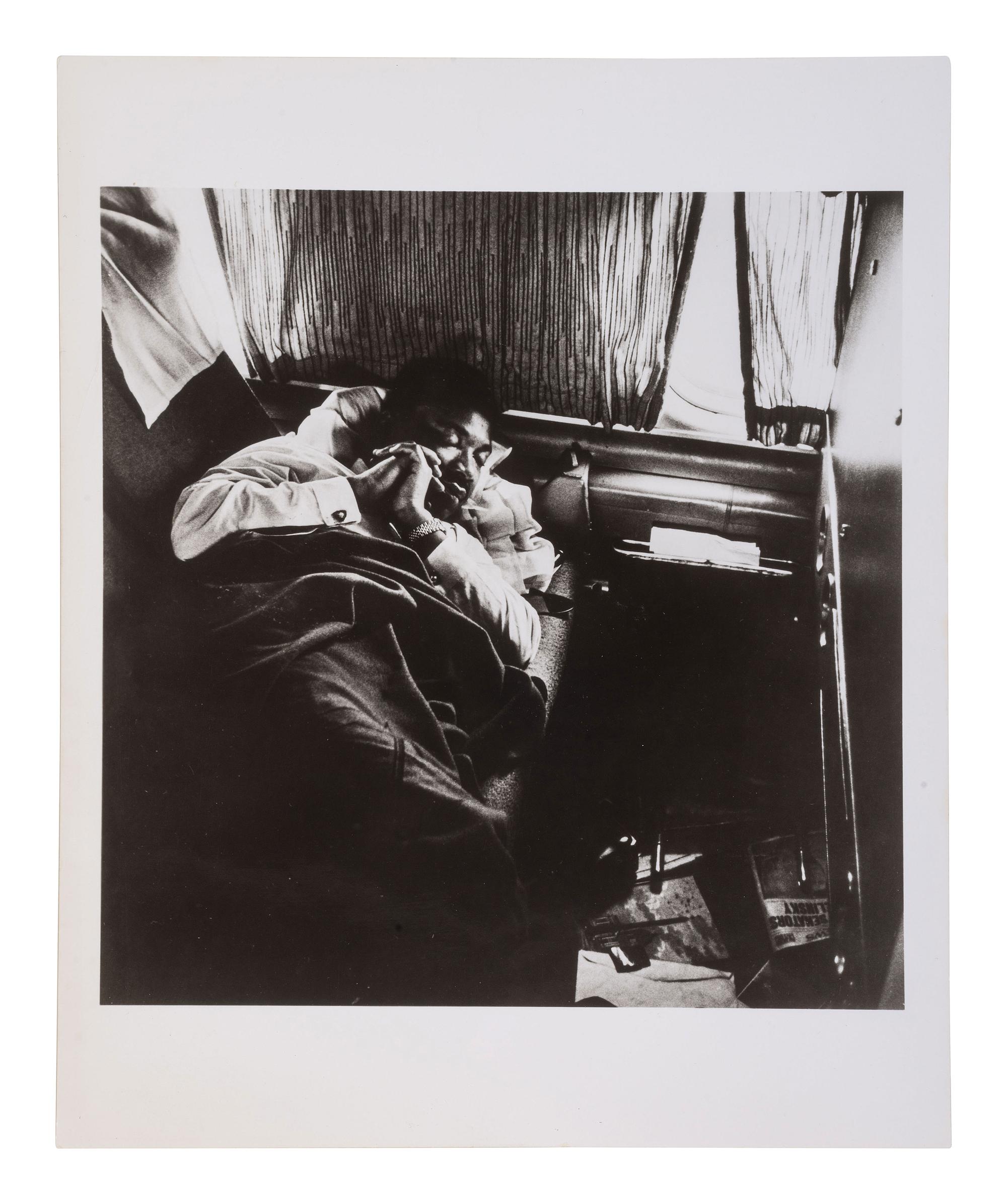 [KING, Martin Luther, Jr. (1929-1968)]. SLEET, Moneta, Jr. (1926-1996), photographer. Dr. King asleep on plane en route to Oslo, Norway to Receive Nobel Peace Prize, 1964 . Printed later.