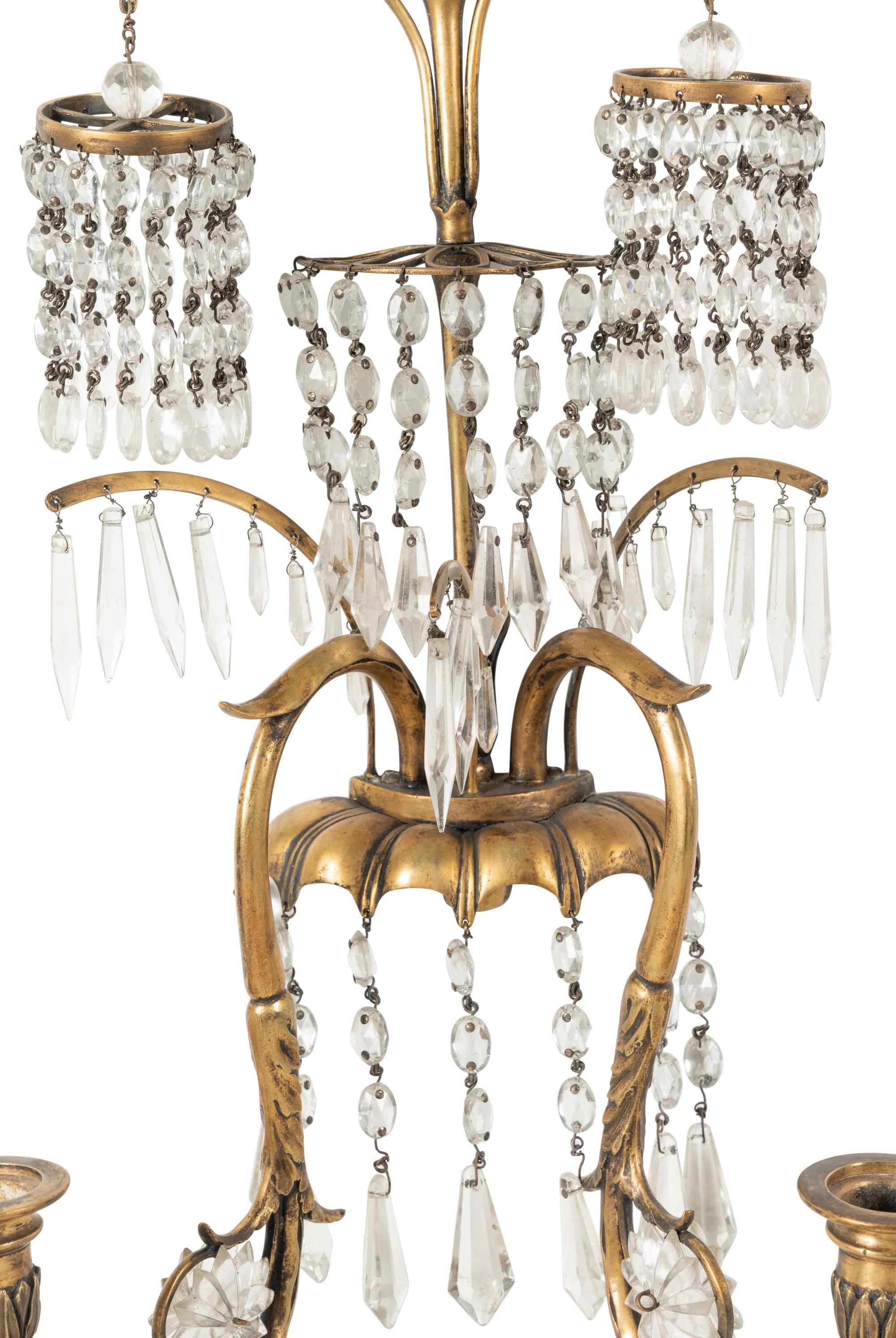 A Pair of Regency Style Gilt Metal and Glass Two-Light Sconces