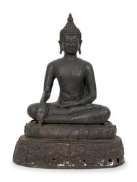 A Cambodian Bronze Figure of Seated Deity on Conforming Base
