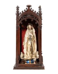 A Gothic Revival Mahogany Reliquary with a Continental Painted Figure of the Madonna