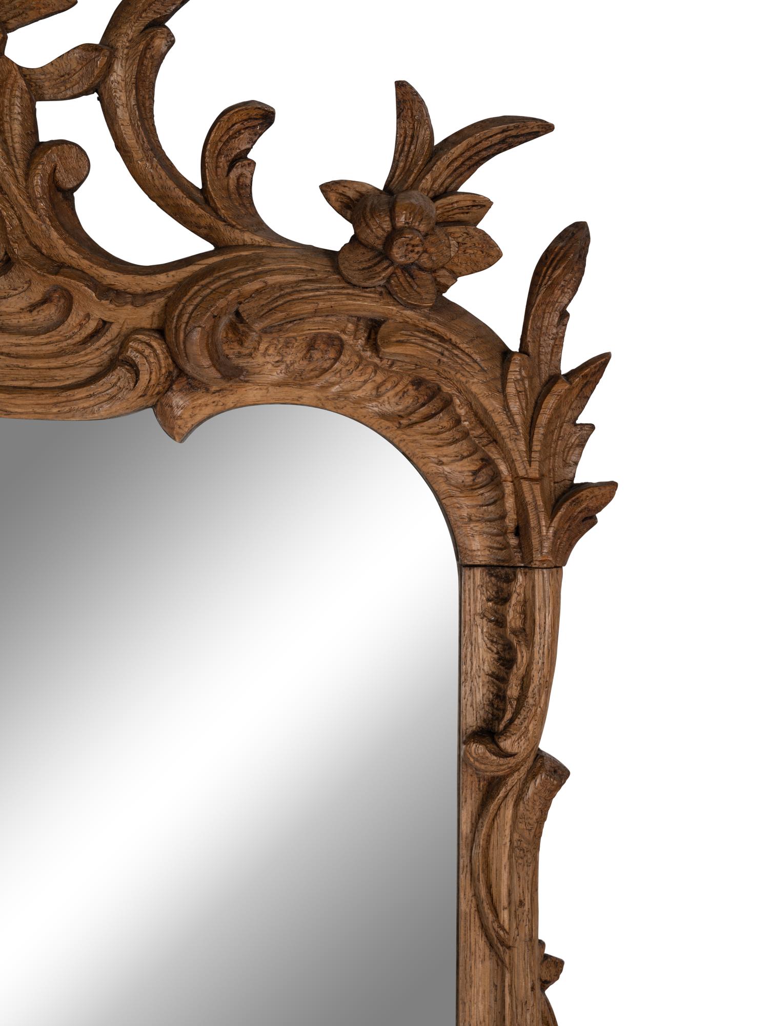 A George II Style Carved Oak Mirror