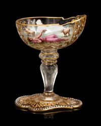A Set of Eight Venetian Enameled Glass Champagne Coupes and a Group of Gilt Decorated Glass Table Articles