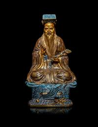 A Chinese Gilt Highlighted Robin's Egg Glazed Porcelain Figure of a Daoist Immortal