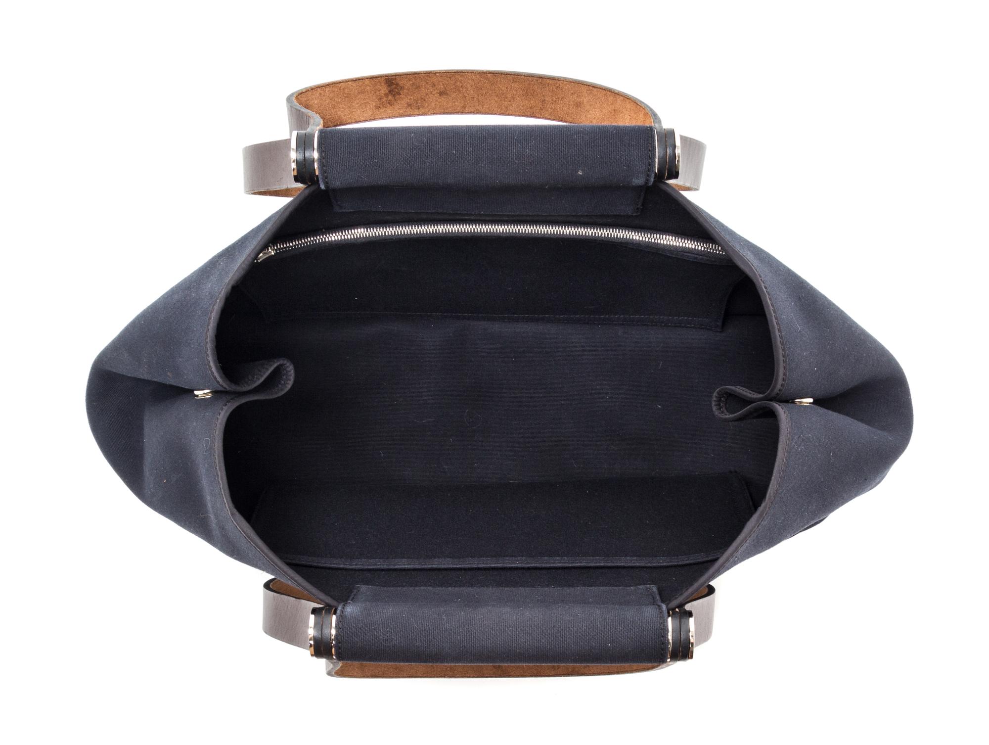 An Hermes Black Canvas Cabag Elan Tote, 10" x 14" x 5.5".